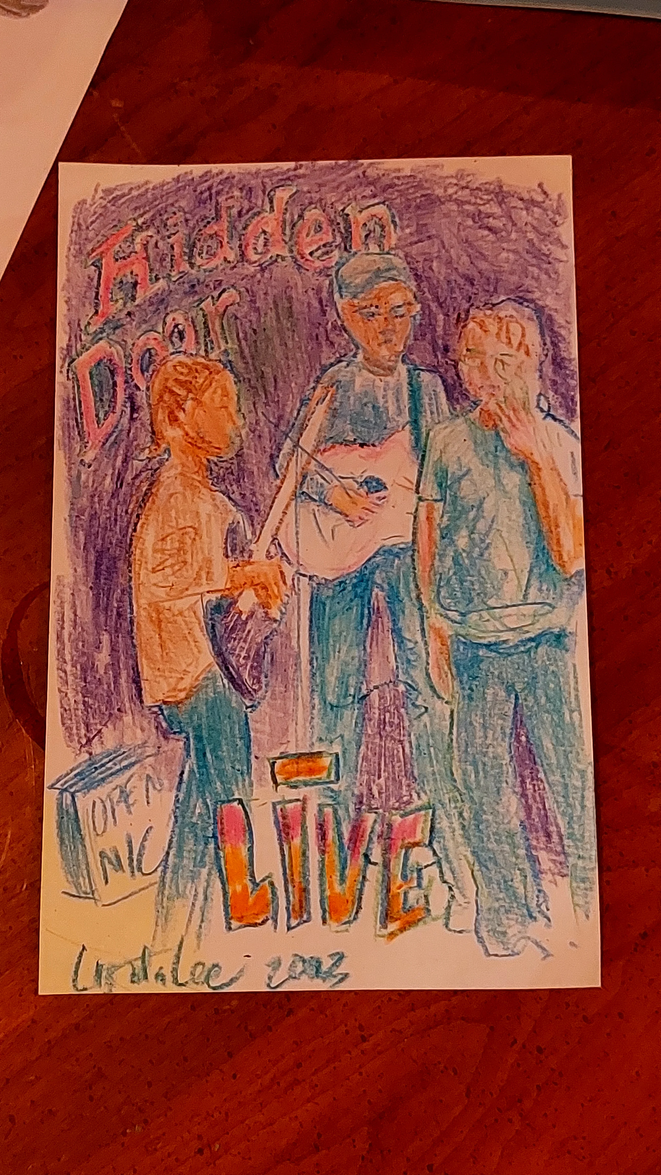 Colored pencil record cover featuring three figures and Hidden Door Live title
